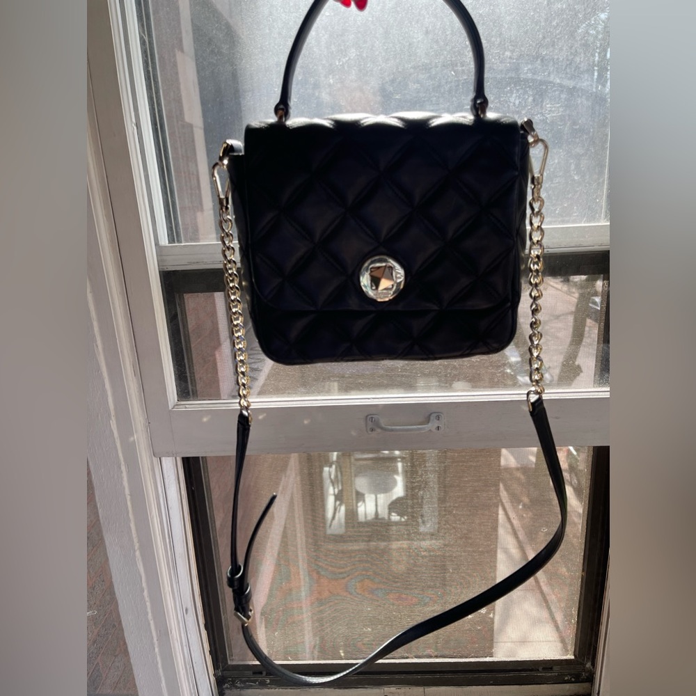 adorable, Crossbody that can fit your phone wallet, and other items comfortably.